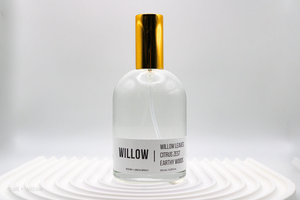 Clear bottle with gold cap labeled 'Willow' on a white background